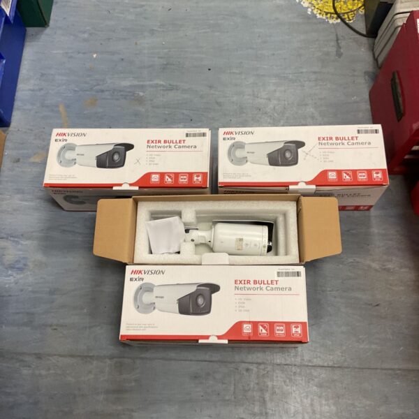 Four boxes of Hikvision EXIR bullet network cameras for outdoor security.