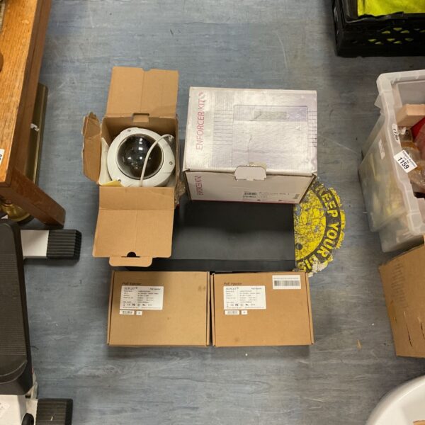 Hikvision network camera kit in original packaging.