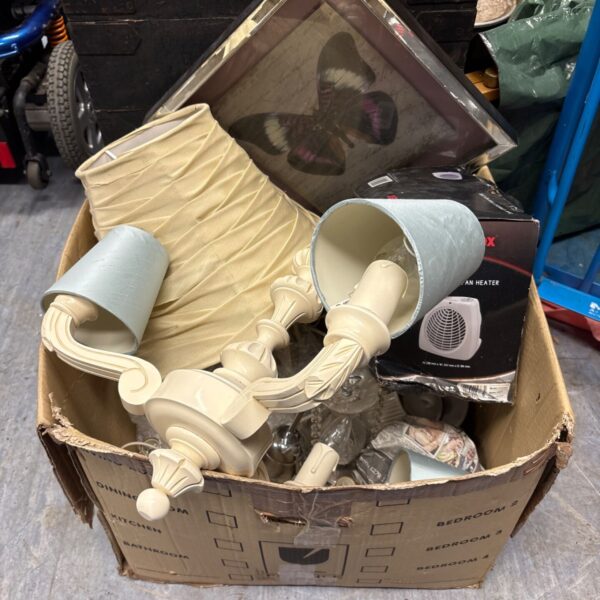 Mixed house clearance lot with lampshades and household items.