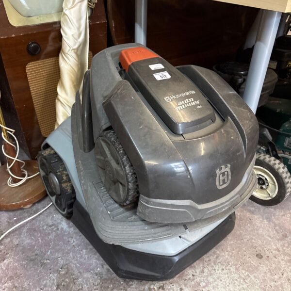 Husqvarna Auto Mower 105 robotic lawn mower in used condition.