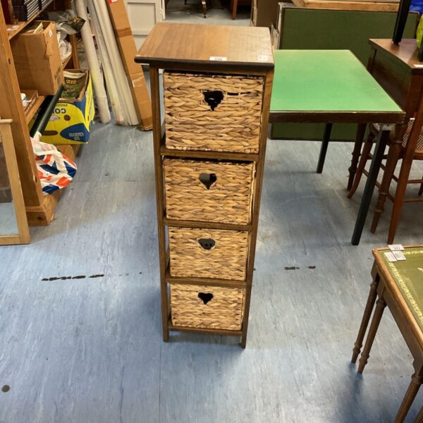 Hyacinth drawer unit with heart-shaped woven drawers and wooden frame.