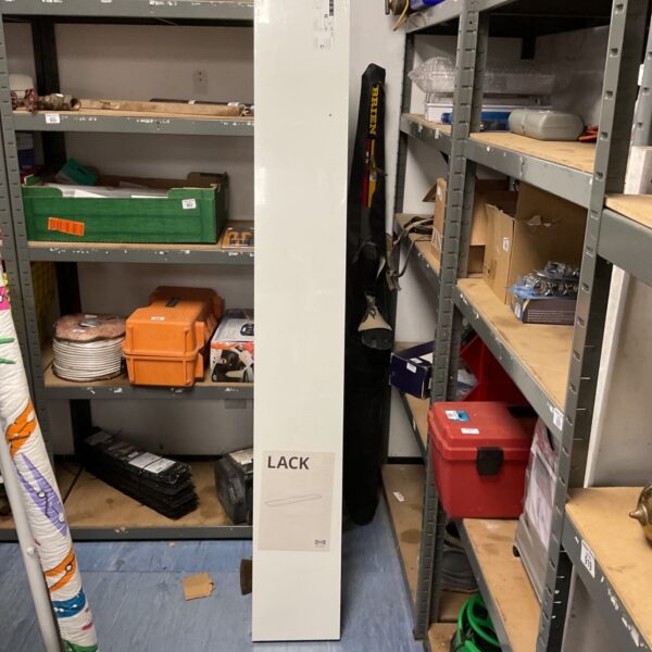 Ikea Lack shelf in a storage unit with other items.