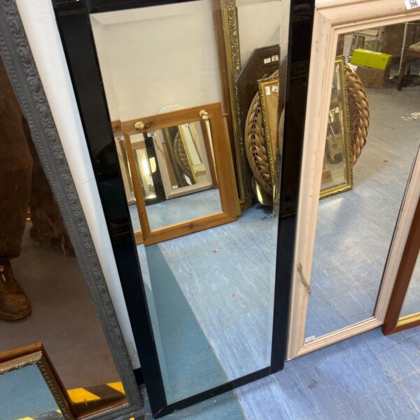 Black IKEA Stave full length mirror for bedroom or hallway.