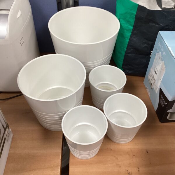 Lot of five white Ikea plant pots for indoor or outdoor use.