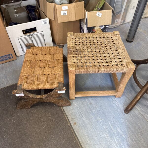 Two vintage woven footstools