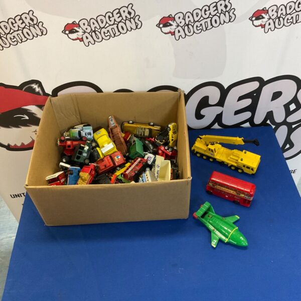 Assorted Matchbox and Corgi Diecast cars incl. mobile crane, Thunderbird 2 (complete with Thunderbird 4), and London Zoo bus