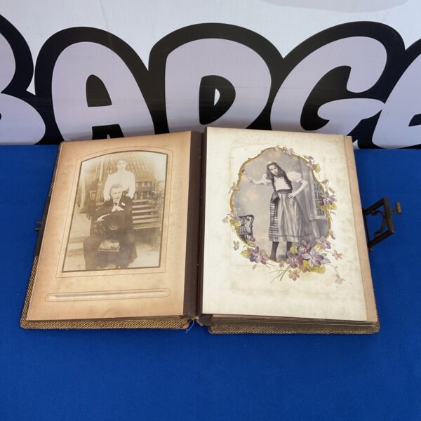 Victorian photograph album with photos