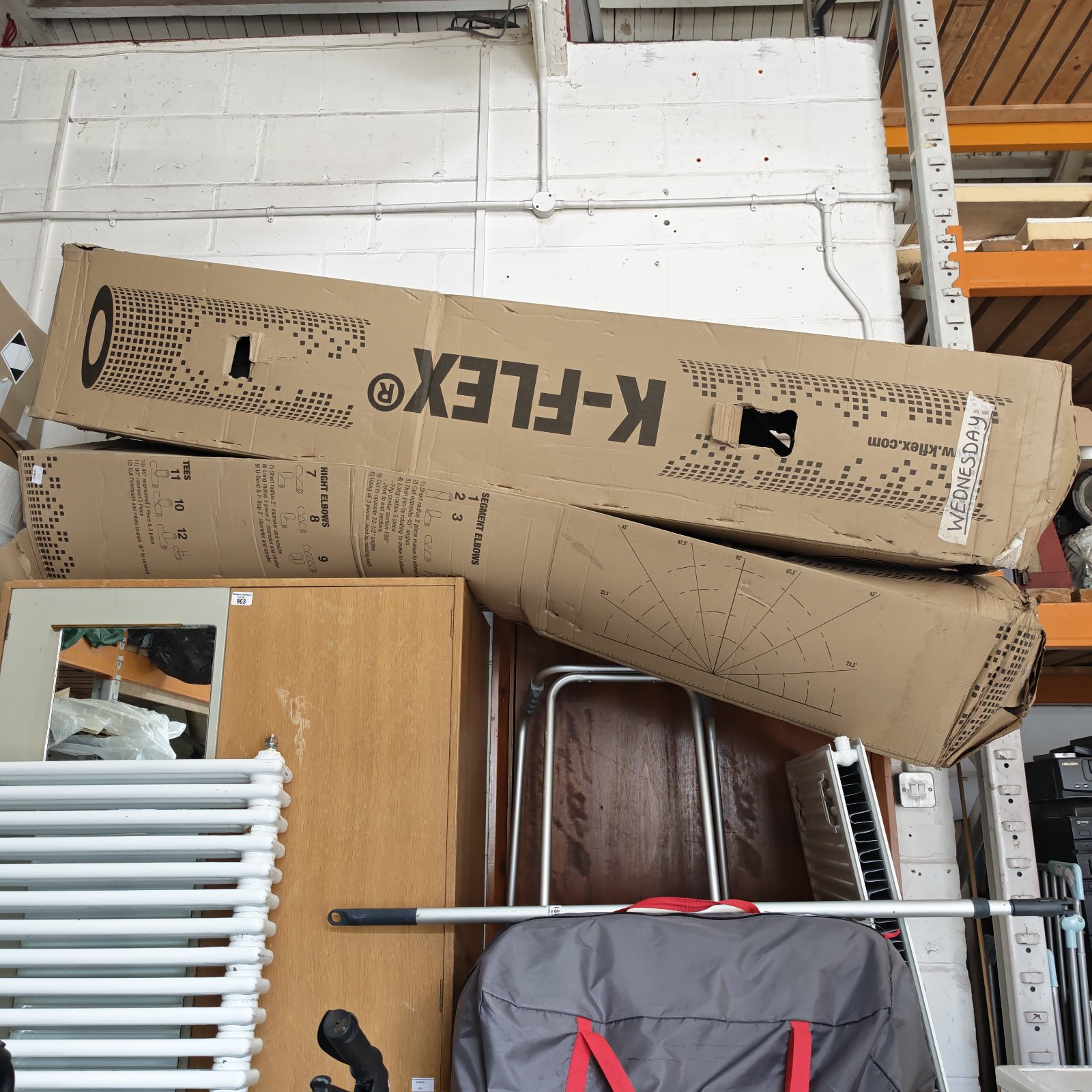 Two rolls of K-flex insulation tubing in original packaging.