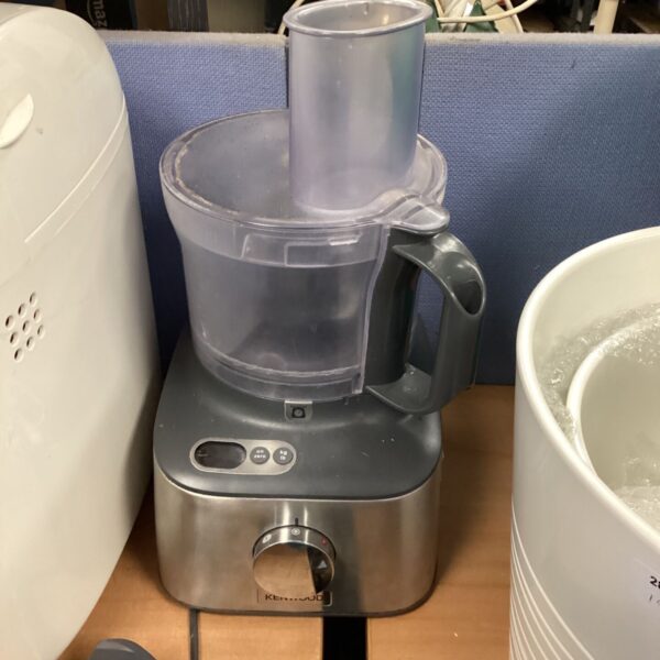 Silver Kenwood food blender on a countertop.