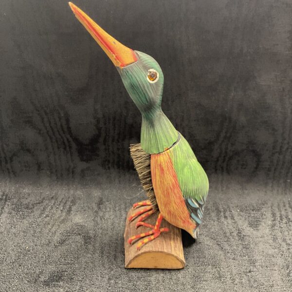 Vintage kingfisher clothes brush with vibrant colours and detailed carving.