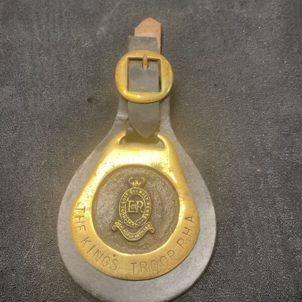 Vintage Kings Troop RHA horse brass with detailed regimental crest.