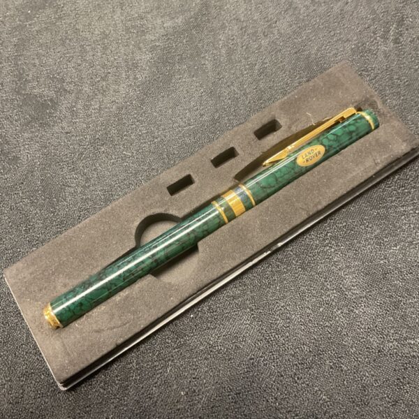 Vintage Land Rover Biro pen with green marbled design.