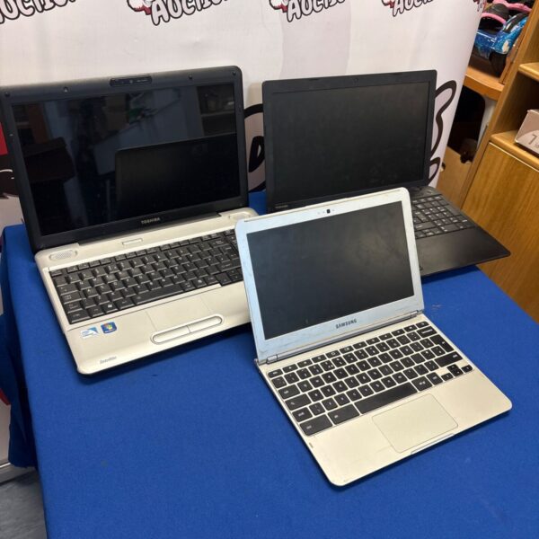 Three used laptops including a Toshiba and Samsung Chromebook for auction.