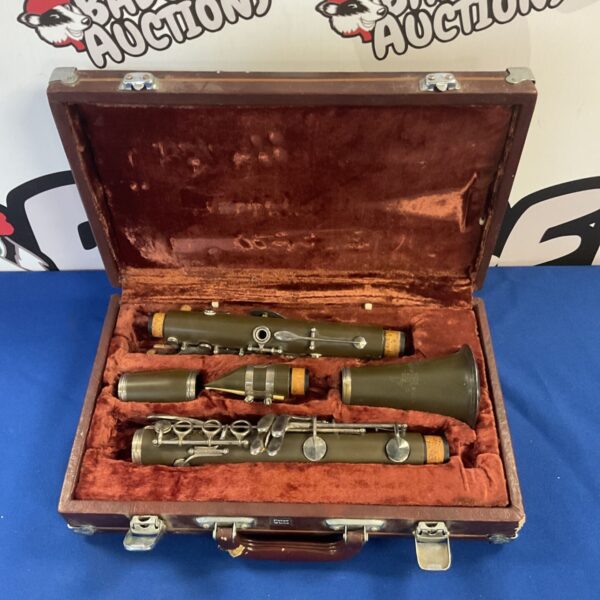 Vintage Lark M4001 military green clarinet in its case.