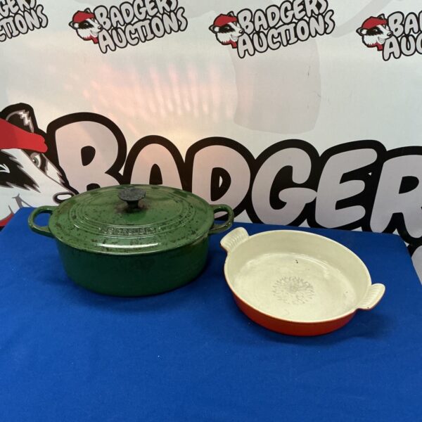 Vibrant Le Creuset casserole dish with enamel coating.