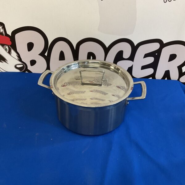 Stainless steel Le Creuset saucepan with lid, 6 litre capacity.