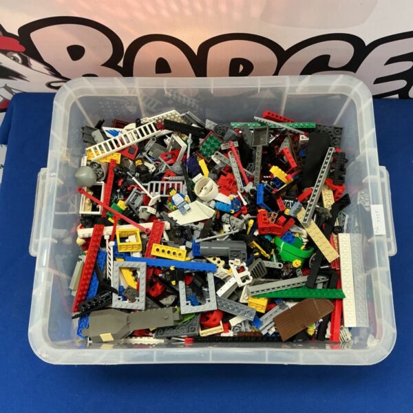Assorted Lego pieces and mini figures in a storage box.