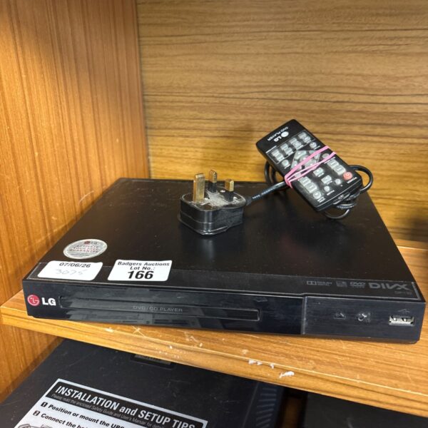 Black LG DP132 DVD player with remote control for home entertainment.
