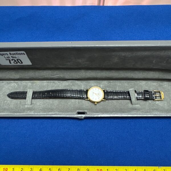 Ladies' Longines quartz wristwatch with a brown leather strap.