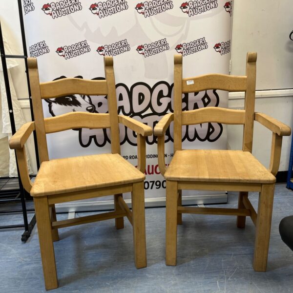 2 Light-colored wooden ladderback armchair with a solid seat