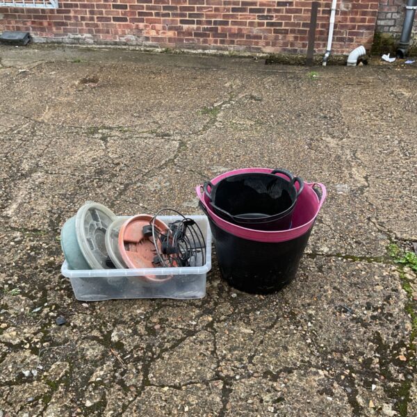 Selection of garden items including buckets