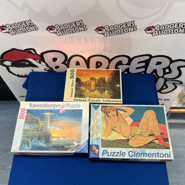 Three Puzzles, incl. Ravensburger, Deluxe Puzzle Collection, and Clementoni