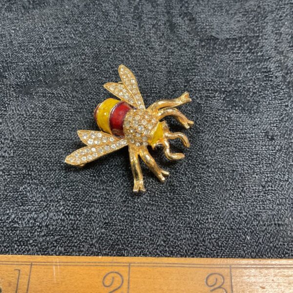 Vintage costume jewellery enamel and white stone bee brooch