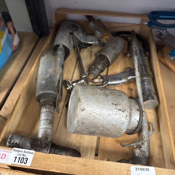 tray of assorted air tools