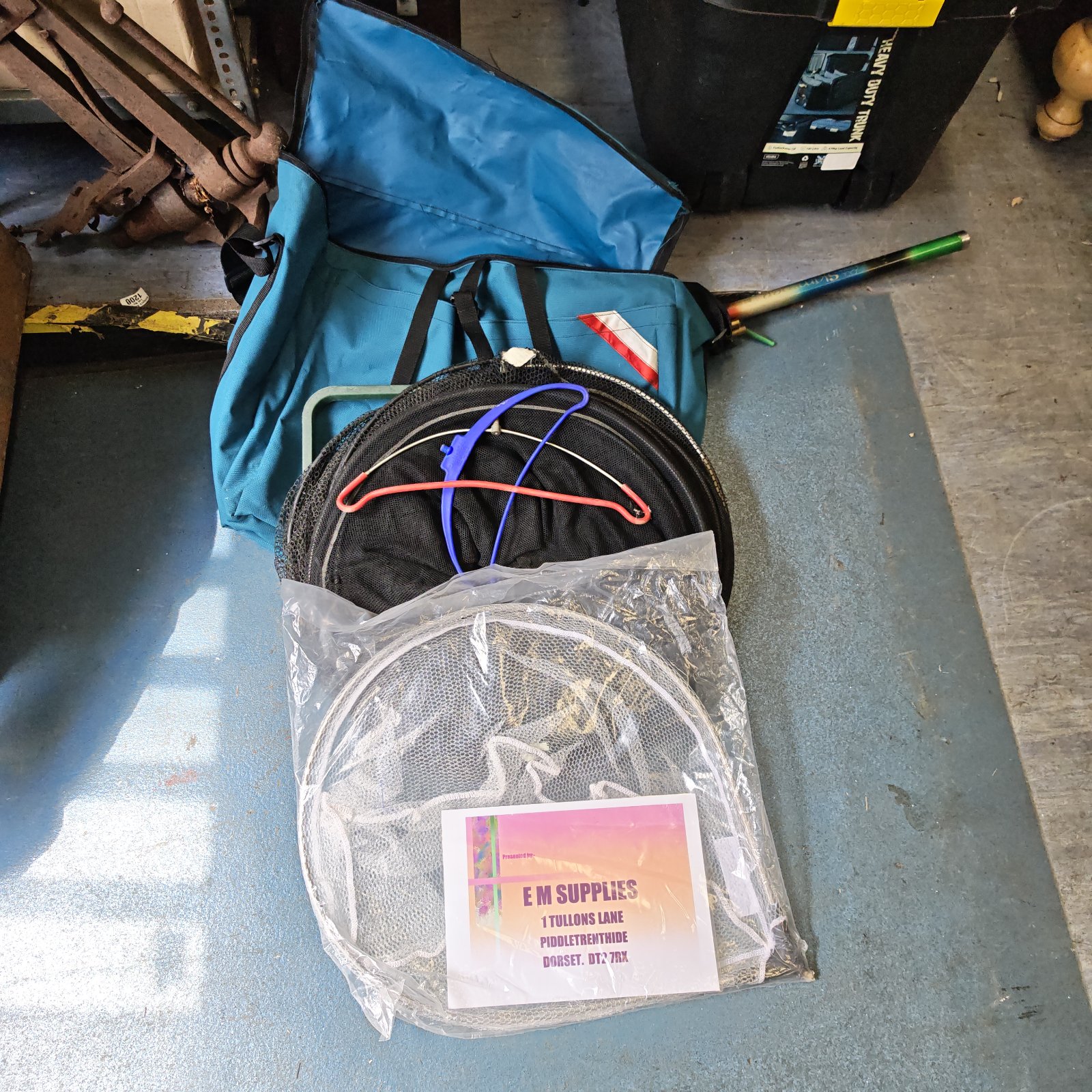 Fishing bag with fishing nets and rod rest