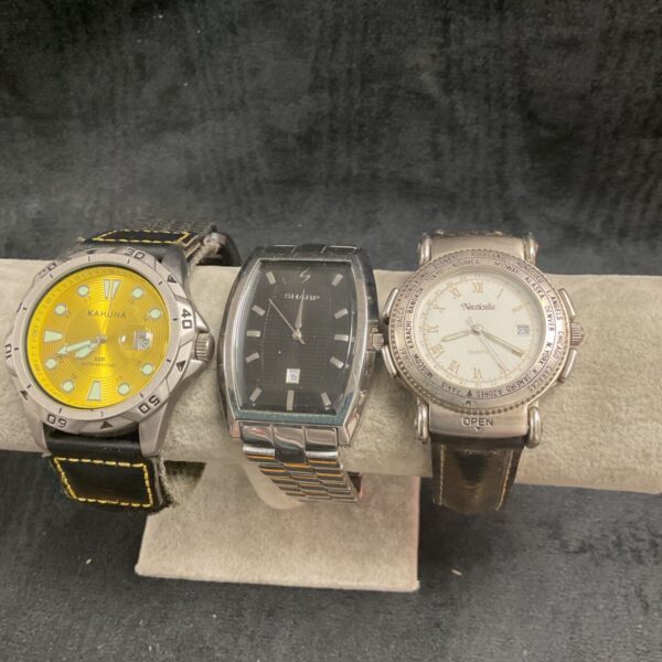 Three Quartz wristwatches kahuna , sharp, and nauticalia
