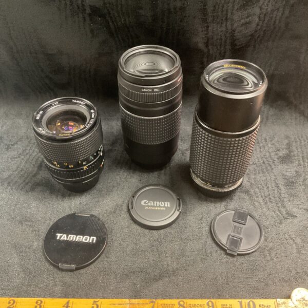 Three Camera lenses Canon zoom lens Ef 75-300mm Tamron Cf Macro 75-34 Lens and Belland Howell 80-205 Lens