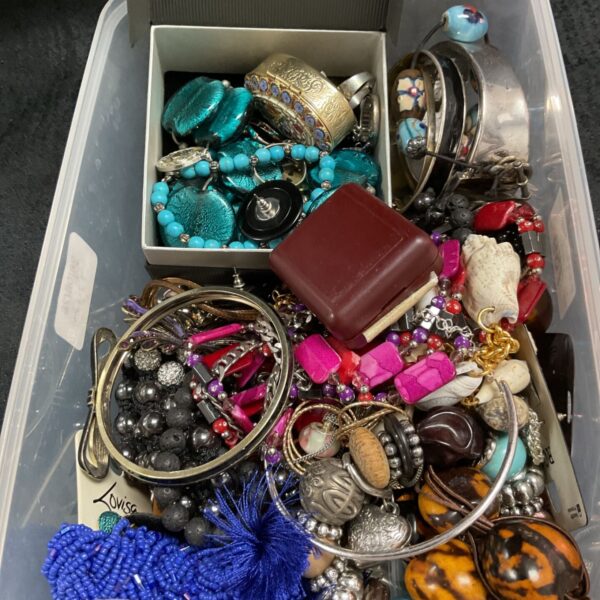 large collection of vintage costume jewellery, including rings and bangles and brooches