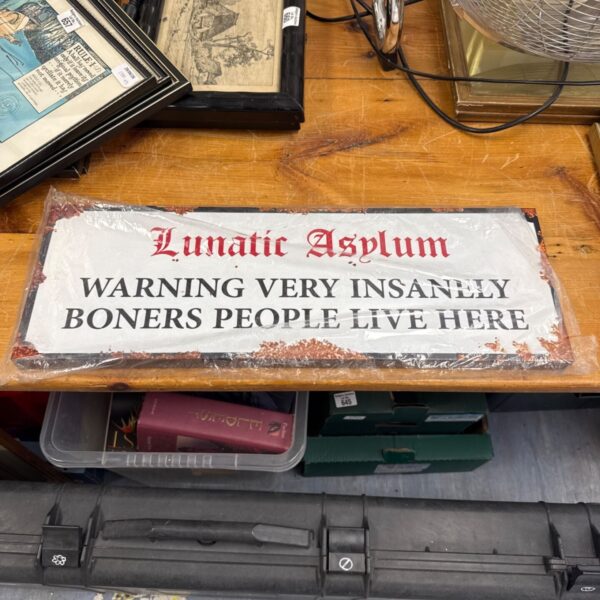 Metal lunatic asylum warning very insanely "boners" (sic) people live here 22.75" length