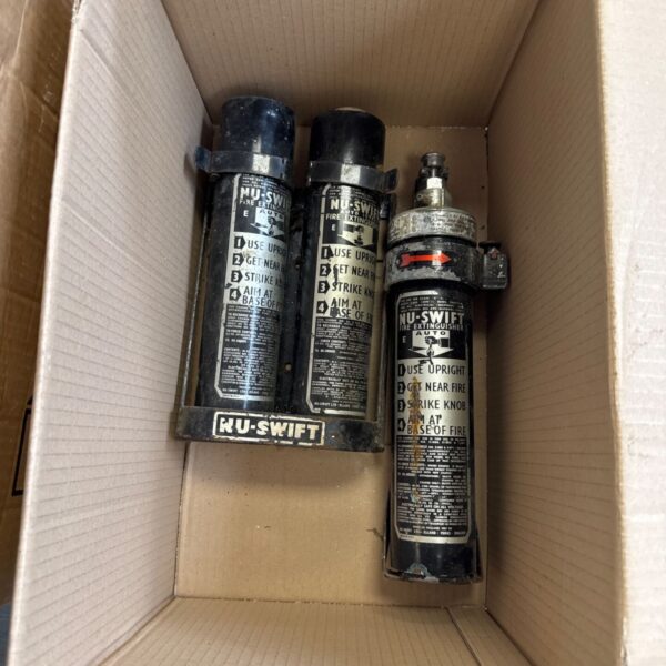 Vintage Nu-Swift car fire extinguisher with two refills