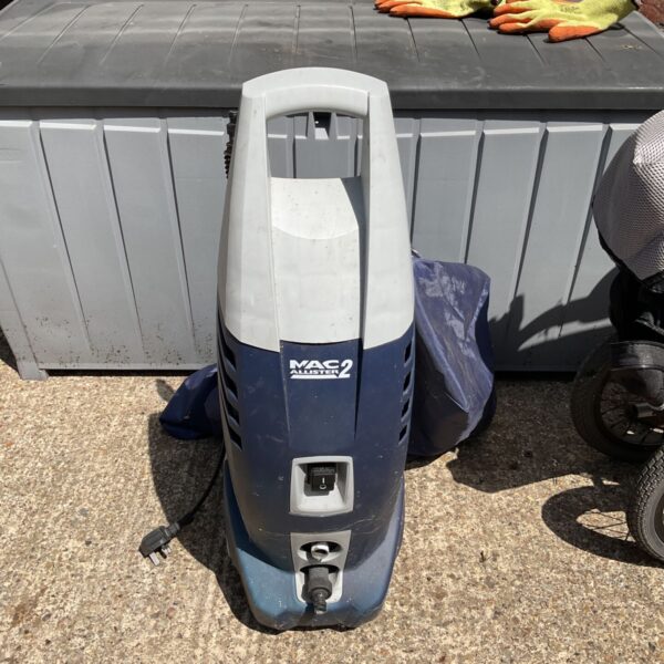 Used Macallister pressure washer for garden and patio cleaning.