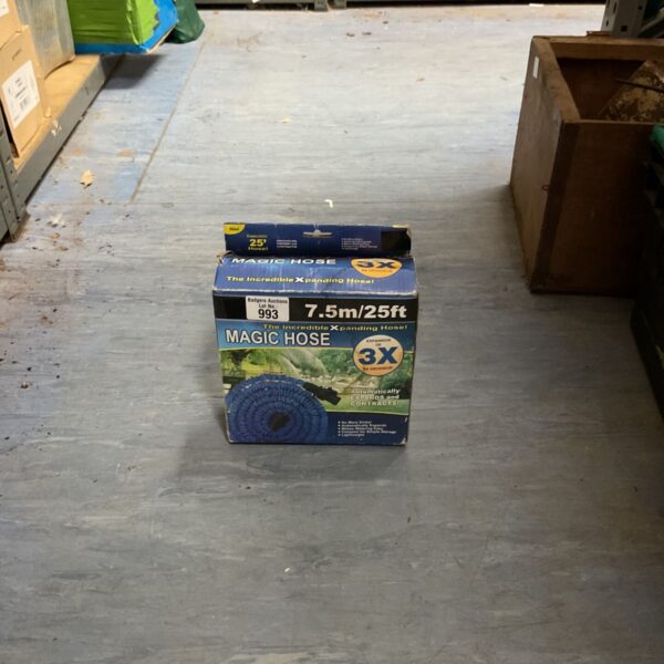 Blue Magic Hose with packaging for garden watering.