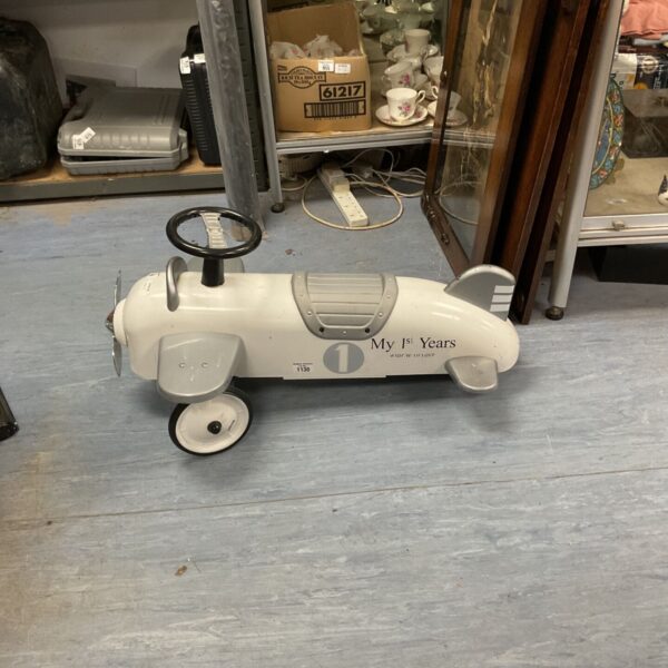 White vintage ride-on toy plane by Magni My 1st Years.