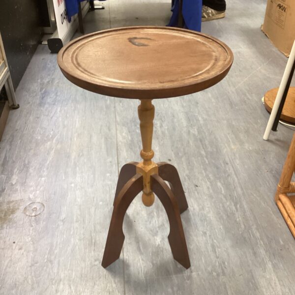 Antique mahogany wine table with curved legs.