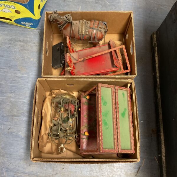 Vintage market stall models and horse carriage for collectors.