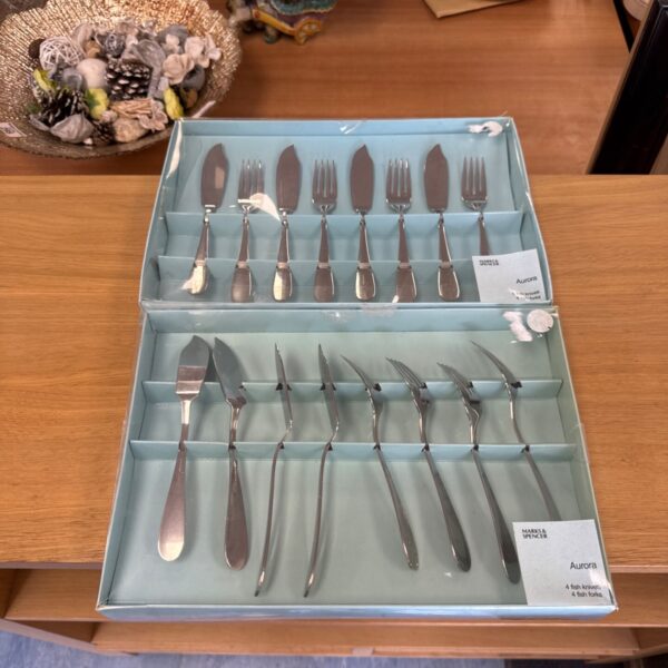 Marks & Spencer Aurora stainless steel fish knife sets displayed.