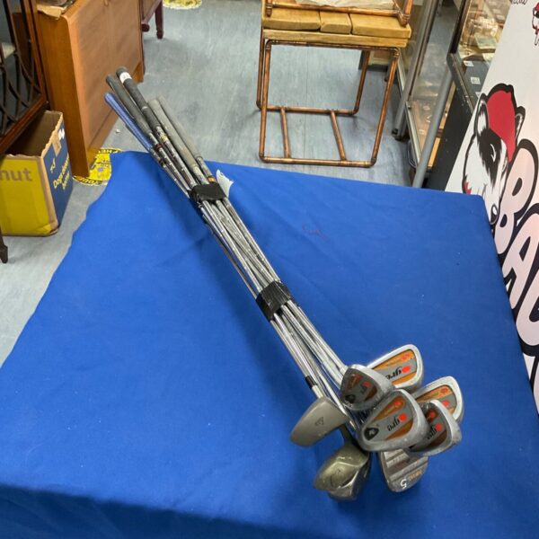 Vintage Masters golf club set with iron clubs.
