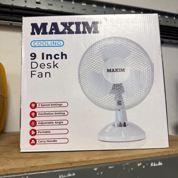 Maxim 9 inch desk fan in original packaging.