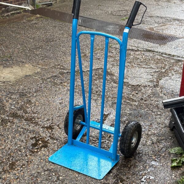 Blue McAllister sack barrow with pneumatic tyres for garden use.