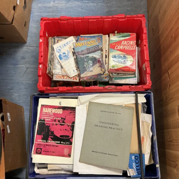 Vintage lot of Meccano magazines and motor racing books.