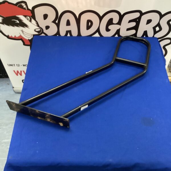 Metal hand grab rail for bathroom or mobility assistance.