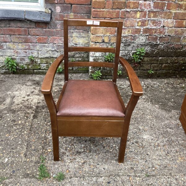 Vintage mid-century military desk chair with oak frame.