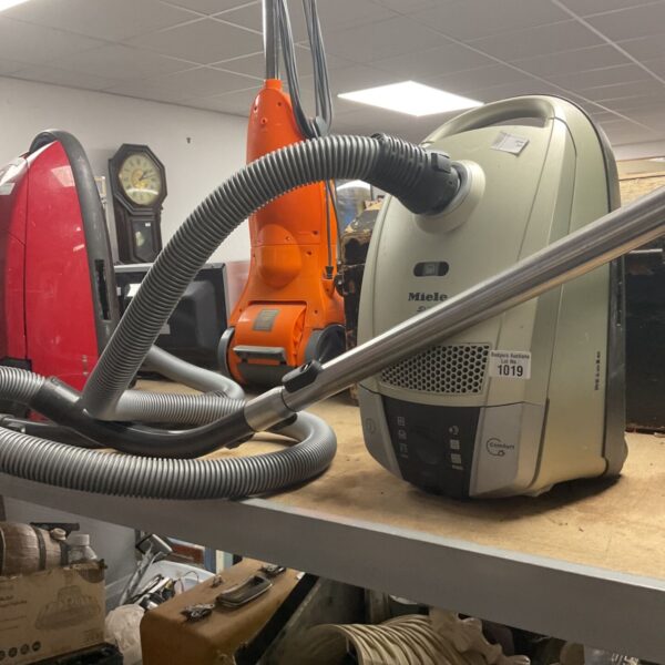 Miele S8 vacuum cleaner with flexible hose, vintage appliance.