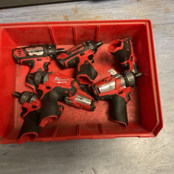 Milwaukee M12 impact drivers in a box, cordless power tools.