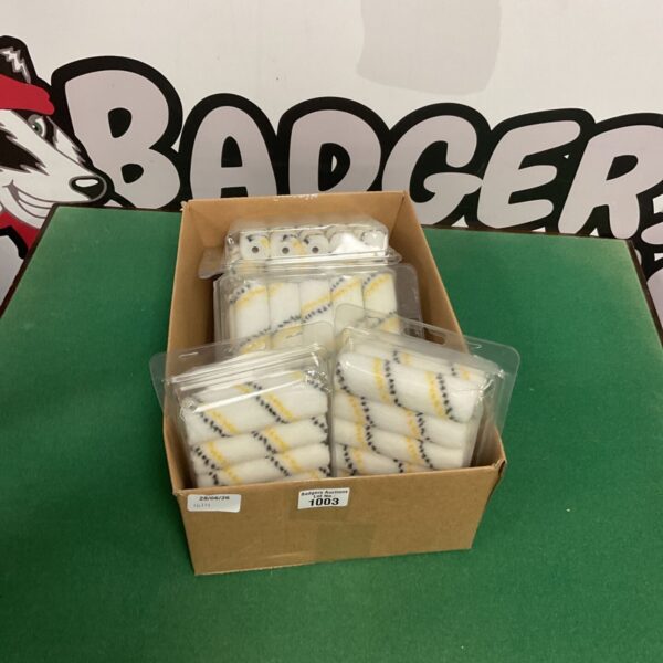 Box of mini paint rollers for DIY home improvement projects.