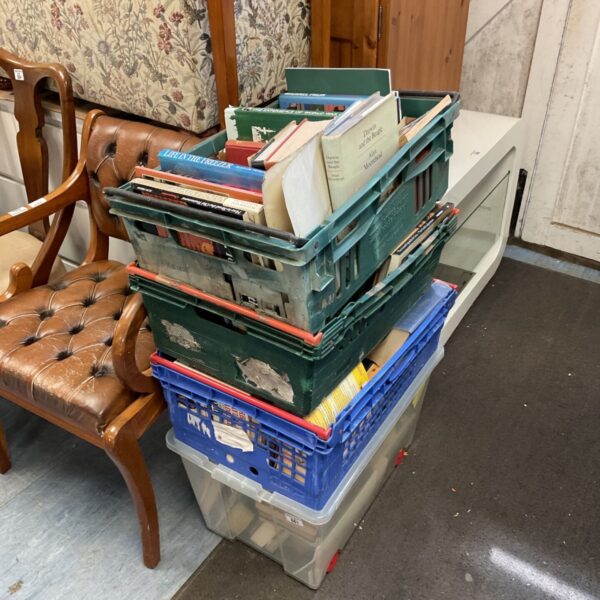 Four crates filled with a mixed book lot, including vintage paperbacks.